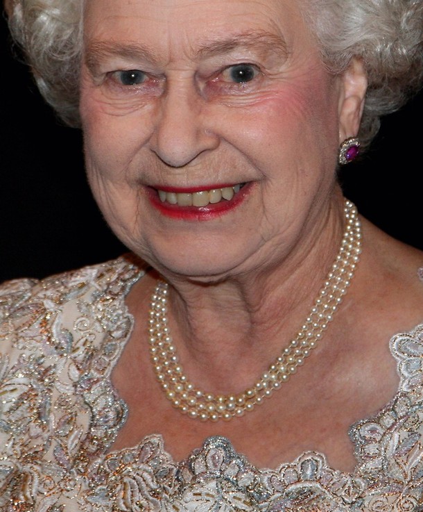 LONDON, ENGLAND - DECEMBER 08:   Queen Elizabeth II  smiles as she attends a reception at Mansion House on December 8, 2009 in London, England. The Queen was at Mansion House to see a performance by the London Symphony Orchestra and to present The Queen's Medal for Music to Sir Colin Davis.
