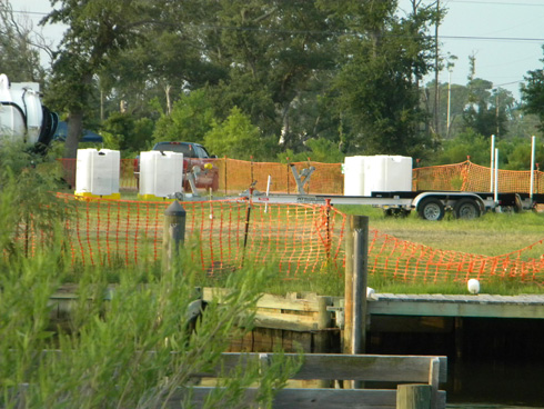 Corner of Canal Road and I-10, in Gulfport, at the Gulfport site used as a BP staging area. Corexit Tanks. (Photo: Shirley Tillman)