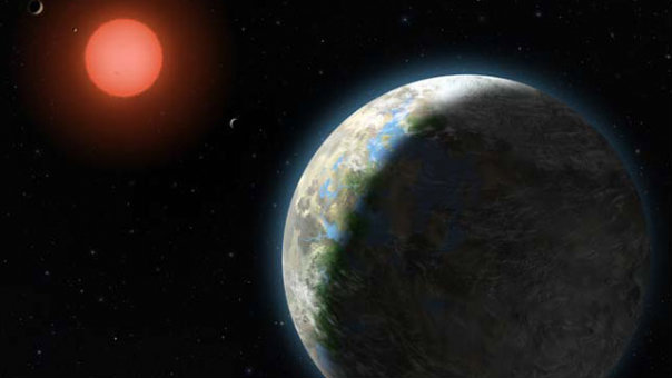This artist's conception shows newly discovered planet Gliese 581g, which has a 37-day orbit right in the middle of the star's habitable zone. The Gliese 581 system and its host red dwarf star is only 20 light years from Earth.