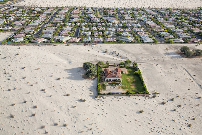Homes in Rancho Mirage, Calif., in the Coachella Valley. Gov. Jerry Brown has ordered a 25 percent statewide reduction in non-agricultural water use. Credit Damon Winter/The New York Times