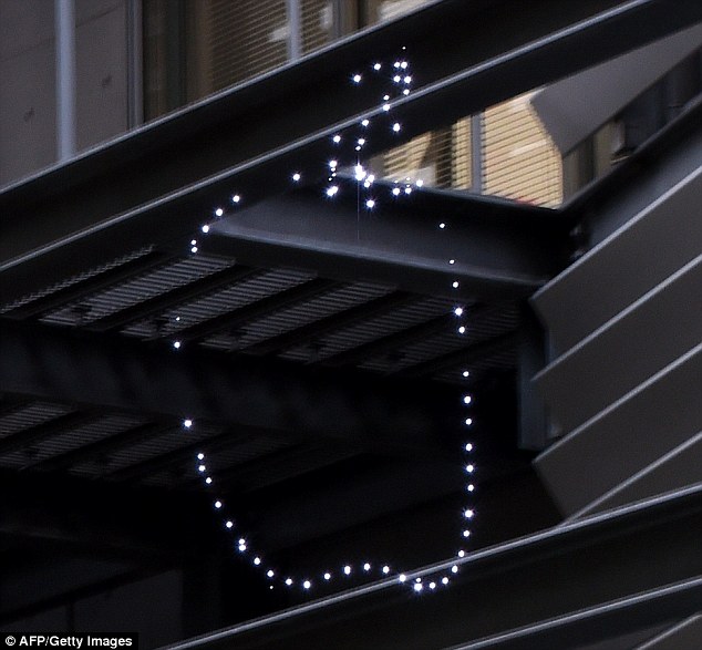 A free-floating image created by firing lasers into thin air was today unveiled in Japan, offering the possibility if one day of projecting messages into a cloudless sky 