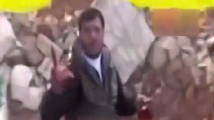 Pose to camera with extracted heart and liver, a chorus of unseen rebels chanting jaded Allahu akbar praise.