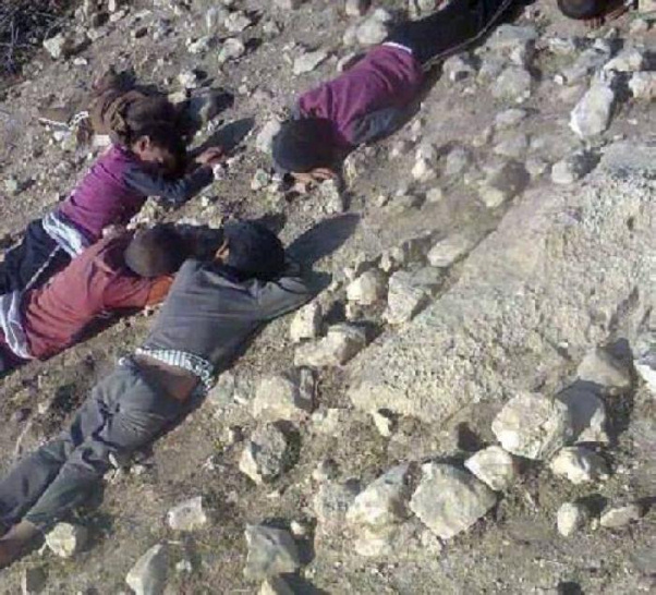 Children lie where they died (image courtesy Catholic.org)
