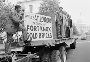 Rep. Hansen (l) in 1979. You may recognize the fellow to the right of the sign. 