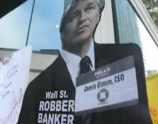 http://blog.alexanderhiggins.com/wp-content/uploads/2011/10/Jamie-Dimon-JP-Morgan-Chase-CEO-Wall-Street-Robber-Banker.jpg
