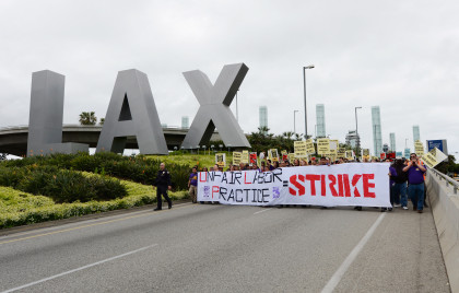 Protesters march at Los Angeles International Airport 143640939 Thousands Of LAX Workers Set For Walkout On Thanksgiving Eve