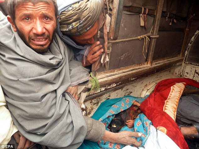 US soldier on SEAL team shoots dead nine sleeping Afghan children before burning their bodies in deadly rampage that killed 16