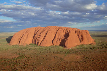 Uluru stands out as one of Australia's most striking landmarks. Uluru stands out as one of Australia's most striking landmarks.
