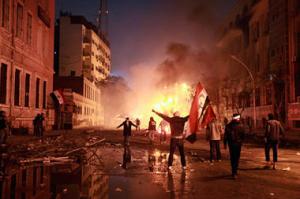 Protesters chant anti-government slogans during a protest condemning the death of soccer fans at Port Said stadium, near the Interior Ministry in Cairo, Feb. 2
