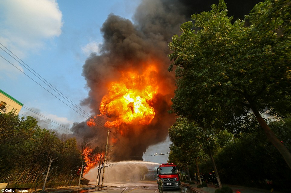 Firefighters battle a fire at a chemical plant after explosion on September 7 in Lishui, China. No injuries were reported as a result of the fire