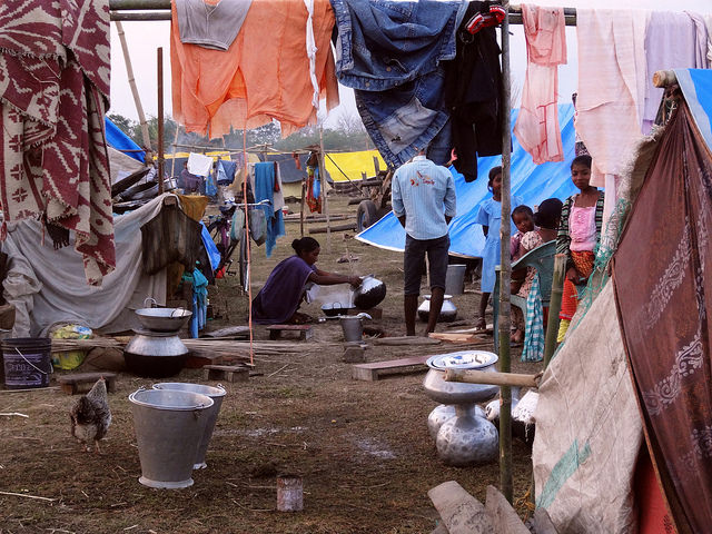 Hunger is constant in the refugee camps, with meagre rations of rice, lentils, cooking oil and salt falling short of most families’ basic needs. Women are forced to walk long distances to fetch firewood for woodstoves. Credit: Priyanka Borpujari/IPS