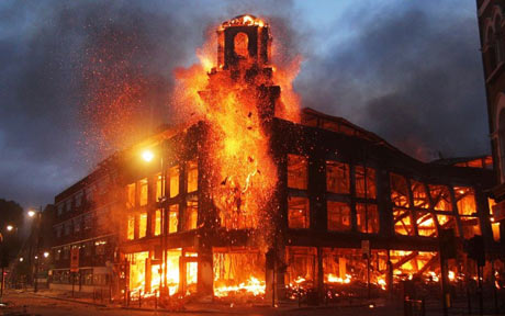 Tottenham ablaze: the riots began early on Sunday (Photo: AP)