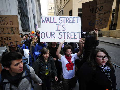 Participants demonstrate in the Occupy Wall Street protest. Participants demonstrate in the Occupy Wall Street protest.