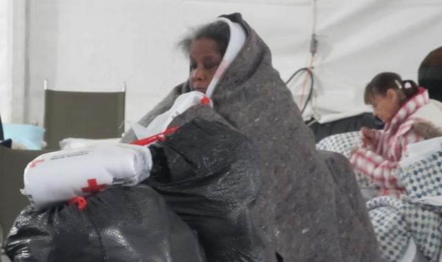 Sandy Refugees Complain of Prison like Conditions at FEMA Tent Camp Photo Sandy Refugees Complain of Prison like Conditions at FEMA Tent Camp womanblanket